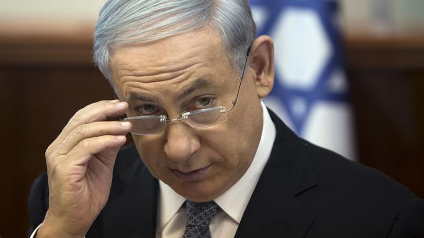 Israel's Prime Minister Benjamin Netanyahu attends the weekly cabinet meeting at his office in Jerusalem May 10, 2015.   REUTERS/Sebastian Scheiner/Pool      TPX IMAGES OF THE DAY      - RTX1CAT6