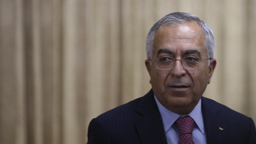 Palestinian Prime Minister Salam Fayyad attends an opening reception of Conference on Cooperation among East Asian Countries for Palestinian Delevopment (CEAPAD) in Tokyo February 13, 2013. Japan co-hosted the CEAPAD with Palestine in Tokyo on Wednesday as a part of efforts toward achieving the Middle East peace, according to the government statement.  REUTERS/Issei Kato (JAPAN - Tags: POLITICS) - RTR3DQ69