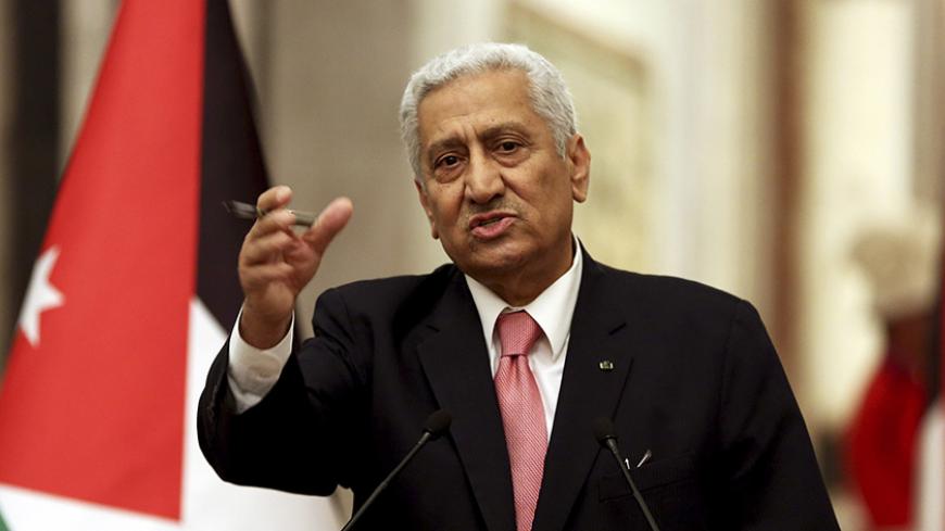 Jordan's Prime Minister Abdullah Ensour speaks at a press conference with Iraqi Prime Minister Haider al-Abadi in Baghdad, December 18, 2014. REUTERS/Hadi Mizban/Pool (IRAQ - Tags: POLITICS) - RTR4IKB0