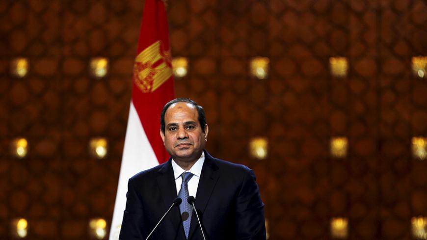 Egypt's President Abdel Fattah al-Sisi speaks during a news conference with Greek President Prokopis Pavlopoulos (not pictured) after their summit at the presidential palace in Cairo, April 23, 2015. REUTERS/Amr Abdallah Dalsh - RTX19ZRW