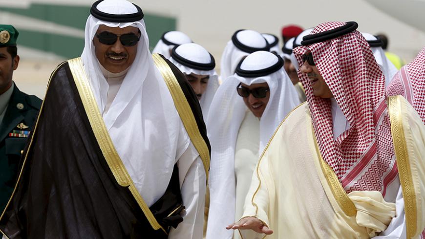 Kuwait's Foreign Minister sheikh Sabah al-Khaled al-Sabah (L) arrives to attend the Gulf Cooperation Council (GCC) meeting in Riyadh, Saudi Arabia, April 30, 2015. Leaders from the GCC group of countries arrive in Saudi Arabia to discuss the ongoing conflict in neighbouring Yemen, Iran's nuclear programme and prepare for a summit with U.S. President Barack Obama next month. REUTERS/Faisal Al Nasser - RTX1AZJL