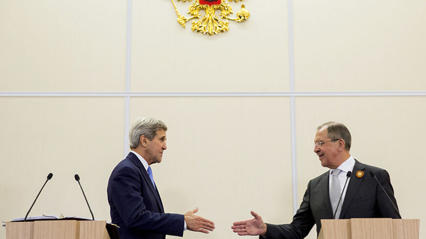 U.S. Secretary of State John Kerry shakes hands with Russian Foreign Secretary Sergey Lavrov after a news conference at the presidential residence of Bocharov Ruchey in Sochi, Russia May 12, 2015.      REUTERS/Joshua Roberts - RTX1CO82