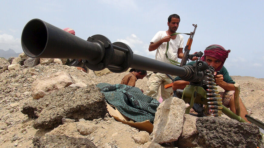 A fighter from the Southern Popular Resistance mans a machine gun at the front line of fighting against Houthi fighters, on the outskirts of Yemen's southern port city of Aden June 6, 2015. REUTERS/Stringer

      TPX IMAGES OF THE DAY      - RTX1FETF