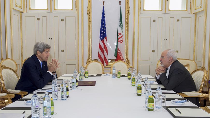 U.S. Secretary of State John Kerry (L) meets with Iranian Foreign Minister Javad Zarif at a hotel in Vienna, Austria June 30, 2015. Kerry and Zarif held a "productive" meeting in Vienna on Tuesday, the State Department said, as negotiations on curbing Iran's nuclear program were extended. REUTERS/State Department/Handout FOR EDITORIAL USE ONLY. NOT FOR SALE FOR MARKETING OR ADVERTISING CAMPAIGNS. THIS IMAGE HAS BEEN SUPPLIED BY A THIRD PARTY. IT IS DISTRIBUTED, EXACTLY AS RECEIVED BY REUTERS, AS A SERVI