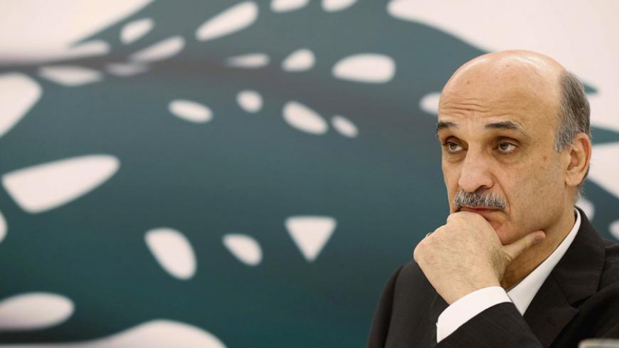 Samir Geagea, leader of the Christian Lebanese Forces, listens during an interview with Reuters at his home in the Christian village of Maarab in the mountains overlooking the seaside town of Jounieh, October 31, 2014. Geagea is a leading candidate for the vacant Lebanese presidency but won't even hazard a guess when there might be an election to fill the post, such is the political uncertainty overshadowing his divided nation. Picture taken October 31, 2014. To match Interview LEBANON-POLITICS/GEAGEA REUTE