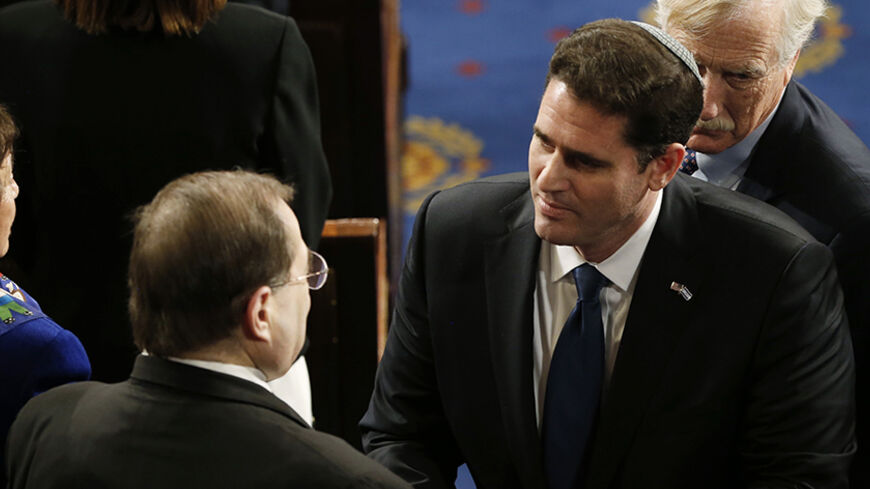 Israeli Ambassador to the United States Ron Dermer (R) shakes hands with U.S. Congressman Jerrold Nadler (D-NY) after Israeli Prime Minister Benjamin Netanyahu's address to a joint meeting of Congress in the House Chamber in Washington, March 3, 2015. Dermer was a key figure in arranging Netanyahu's visit to Washington and his speech before Congress. REUTERS/Jonathan Ernst (UNITED STATES) - RTR4RX8E
