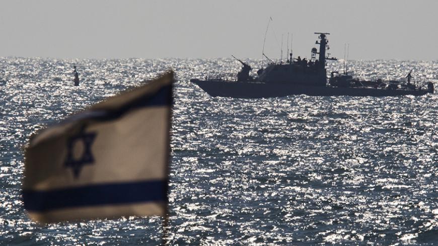 An Israeli naval vessel is seen in the Mediterranean sea outside the port of Ashdod, Israel June 29, 2015. Israel said on Monday it had blocked a boat leading a four-vessel protest flotilla of foreign activists from reaching the Gaza Strip and forced the vessel to sail to the Israeli port. REUTERS/Amir Cohen - RTX1I9PS