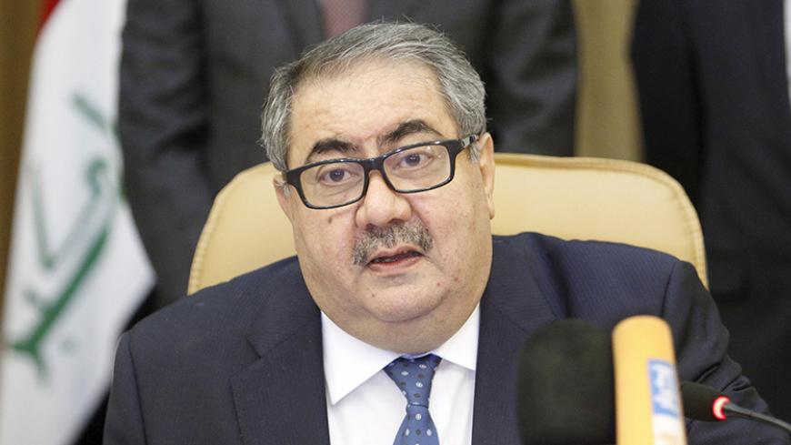 Iraqi Finance Minister Hoshiyar Zebari speaks during a news conference in Baghdad July 12, 2015. Iraq and the World Bank signed a $350 million loan agreement on Sunday to fund emergency reconstruction in towns recaptured from Islamic State militants, a deal Baghdad said marked the first international help to rebuild areas devastated by war. REUTERS/Khalid al-Mousily 

 - RTX1K31J