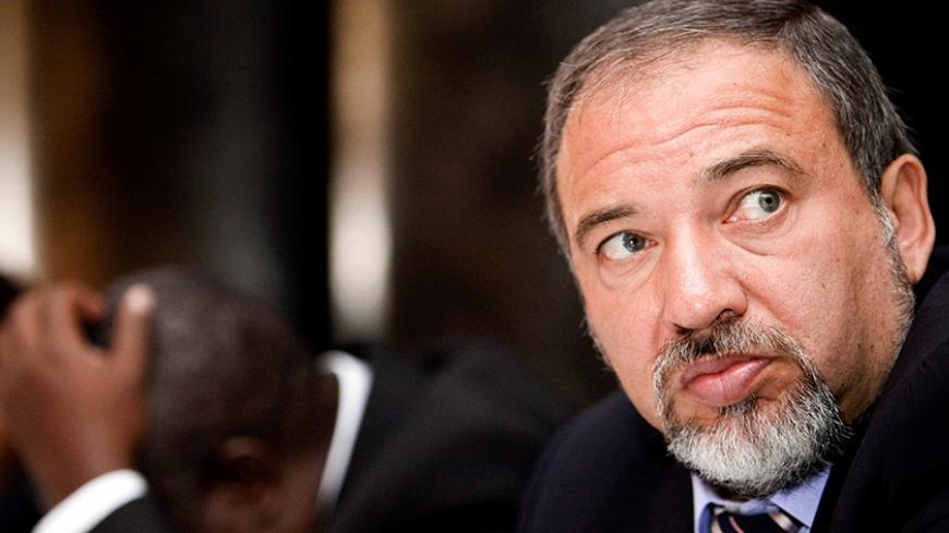 Israel's Foreign Minister Avigdor Liberman attends a meeting with the business community in Uganda's capital Kampala, September 10, 2009. Lieberman, accompanied by business and military delegation, is on an official African visit to Ethiopia, Kenya, Ghana, Uganda, and Nigeria. REUTERS/James Akena (UGANDA POLITICS BUSINESS) - RTR27O1U