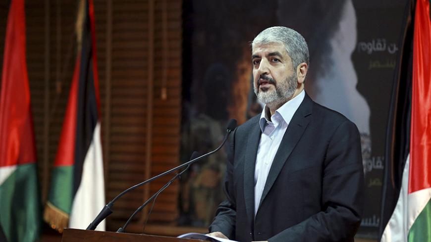 Hamas leader Khaled Meshaal talks during a news conference in Doha July 23 ,2014. Meshaal said he was ready to accept a humanitarian truce in Gaza where the Islamist group is fighting an Israeli military offensive, but would not agree to a full ceasefire until the terms had been negotiated. REUTERS/Stringer (QATAR - Tags: CIVIL UNREST MILITARY POLITICS CONFLICT) - RTR3ZVTJ