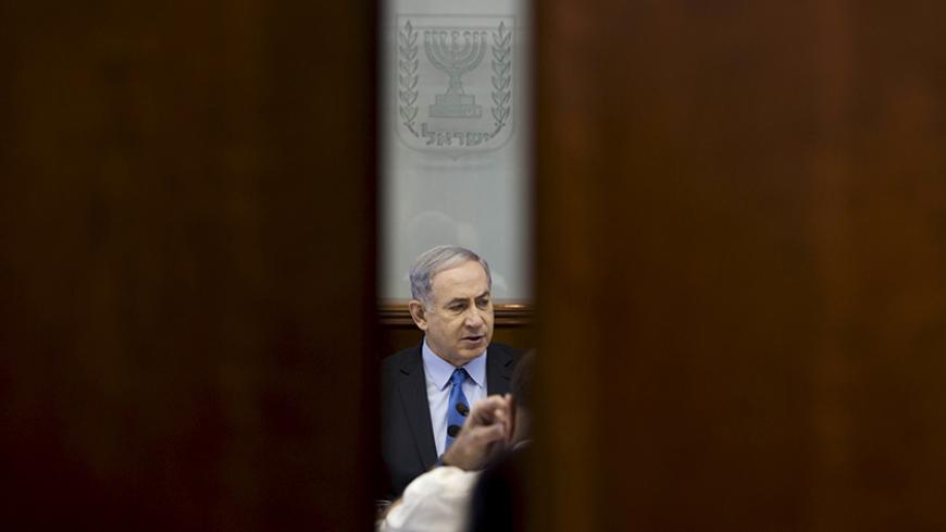 Israel's Prime Minister Benjamin Netanyahu attends the weekly cabinet meeting at his office in Jerusalem July 12, 2015. REUTERS/Abir Sultan/Pool - RTX1K1VR