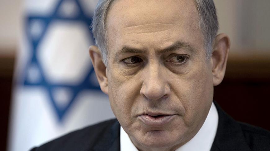 Israel's Prime Minister Benjamin Netanyahu attends the weekly cabinet meeting at his office in Jerusalem September 6, 2015. Netanyahu said on Sunday Israel could not afford to take in refugees fleeing the war in neighbouring Syria and vowed to surround Israel with security fences on all its borders. REUTERS/Menahem Kahana/Pool - RTX1RB2V