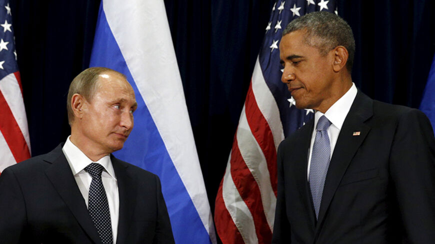U.S. President Barack Obama and Russian President Vladimir Putin look towards one another during their meeting at the United Nations General Assembly in New York September 28, 2015. REUTERS/Kevin Lamarque - RTX1SYAC