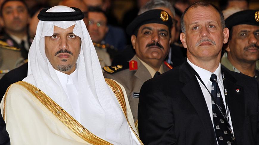 Jordan's Prince Prince Faisal bin al-Hussein (R) and former Commander of Royal Saudi Navy Special Forces Prince Sultan bin Khalid Al-Faisal attend the opening ceremony of the Middle East Special Operations Commanders Conference (MESOC) in Amman May 5, 2014. REUTERS/Majed Jaber (JORDAN - Tags: POLITICS MILITARY ROYALS) - RTR3NT7M