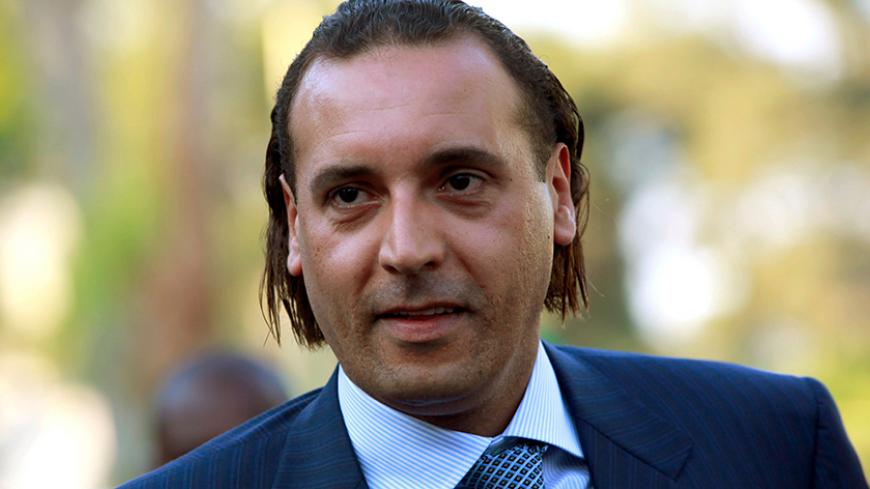 Hannibal Gaddafi, son of Libyan leader Muammar Gaddafi, attends the signing agreement ceremony between Libya's Shipping Corporation and STX Europe to build a cruise ship, in Tripoli June 30, 2010.  Oslo-based STX Europe, the world's largest vessel building group, will provide Libya with the first Arab cruise liner. REUTERS/Ismail Zitouny  (LIBYA - Tags: POLITICS BUSINESS MARITIME TRANSPORT) - RTR2FYOE