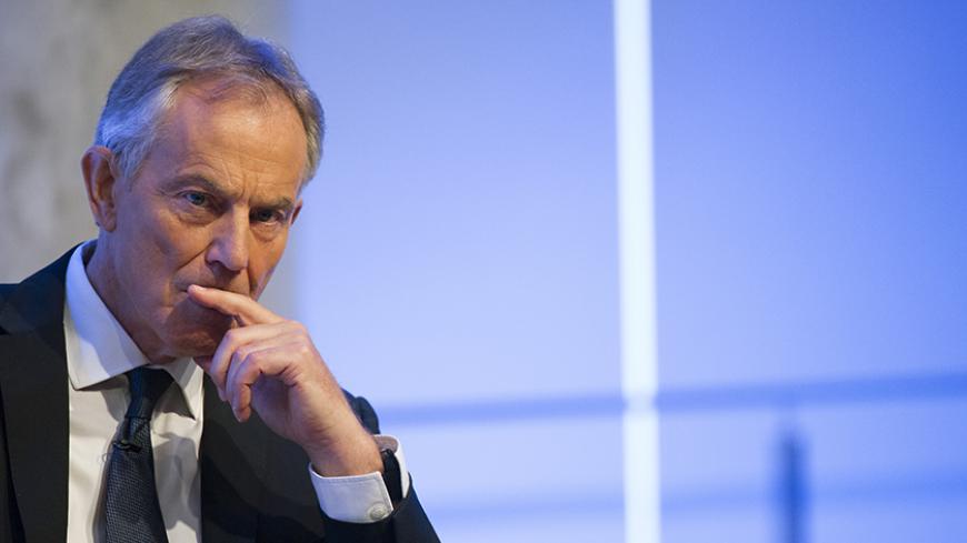 Former British Prime Minister Tony Blair listens to a question during an appearance at the 9/11 Memorial Museum in New York October 6, 2015. REUTERS/Brendan McDermid - RTS3AIQ