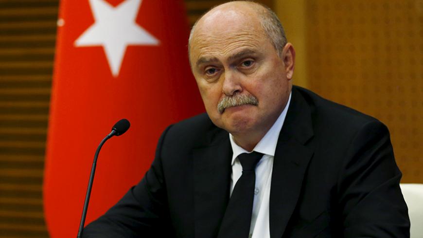 Turkish Foreign Minister Feridun Sinirlioglu addresses the media in Ankara, Turkey, October 16, 2015. REUTERS/Umit Bektas - RTS4Q7Z
