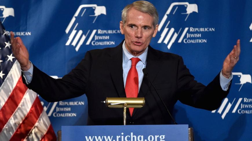 Sen. Rob Portman (R-OH) speaks during the Republican Jewish Coalition Spring Leadership Meeting in Las Vegas, Nevada April 25, 2015. REUTERS/David Becker - RTX1A9CG