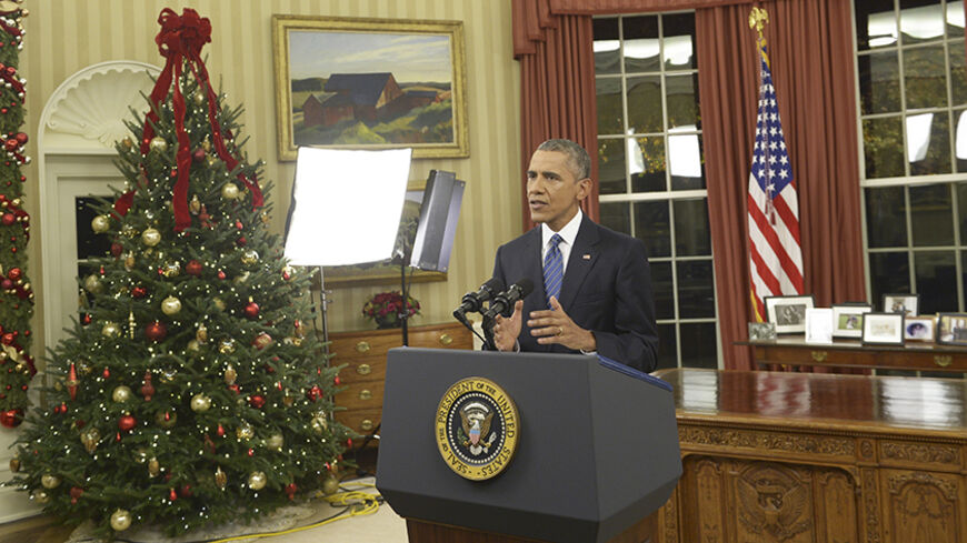 U.S. President Barack Obama speaks about counter-terrorism and the United States fight against Islamic State during an address to the nation from the Oval Office of the White House in Washington, December 6, 2015.  REUTERS/Saul Loeb/Pool - RTX1XHB7