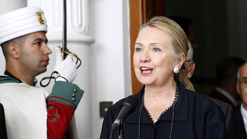 U.S. Secretary of State Hillary Clinton answers questions from journalists after a meeting with Algeria's President Abdelaziz Bouteflika (not pictured) at the Presidential Palace in Algiers October 29, 2012. REUTERS/Louafi Larbi (ALGERIA - Tags: POLITICS) - RTR39QKQ