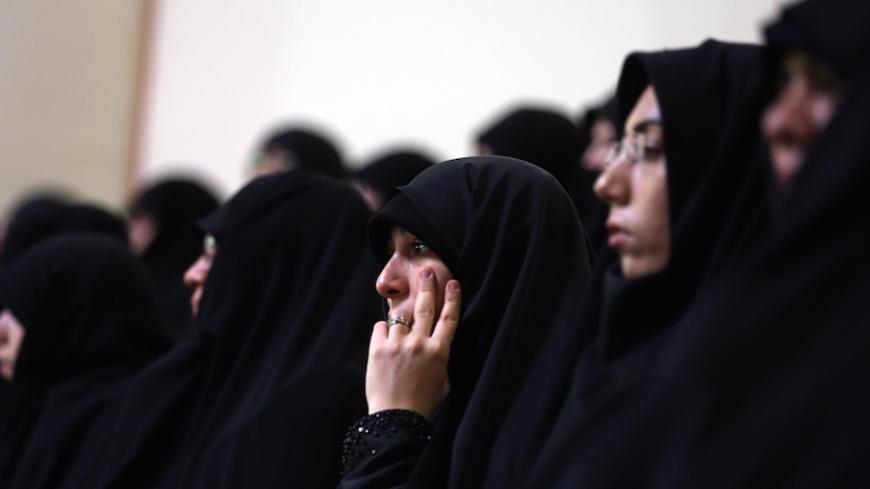 Iranian women attend the 28th International Islamic Unity Conference chaired by the Iranian President in the capital Tehran on January 7, 2015. AFP PHOTO / ATTA KENARE (Photo credit should read ATTA KENARE/AFP/Getty Images)