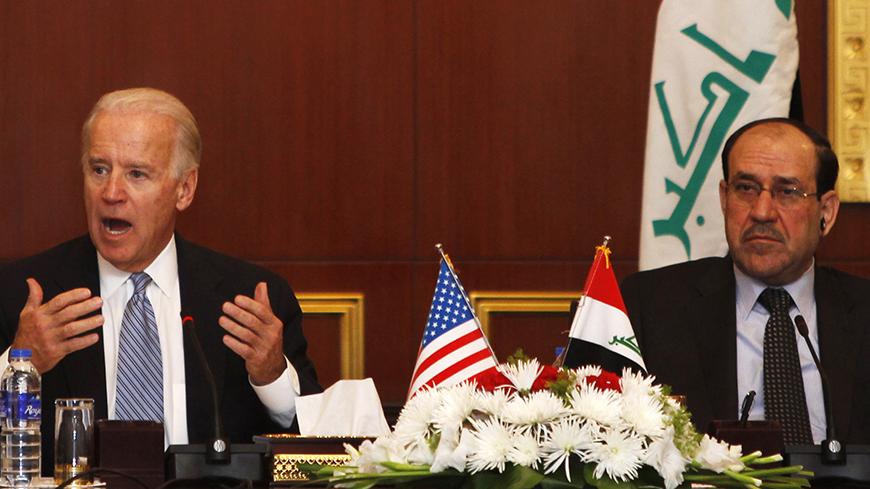 U.S. Vice President Joe Biden (L) meets with Iraq's Prime Minister Nuri al-Maliki during a joint news conference in Baghdad November 30, 2011. U.S. Vice President Joe Biden said on Wednesday the U.S. troop withdrawal from Iraq opened a new phase in relations between the two countries, including a robust security partnership. REUTERS/Saad Shalash (IRAQ - Tags: POLITICS CONFLICT MILITARY) - RTR2UN9O