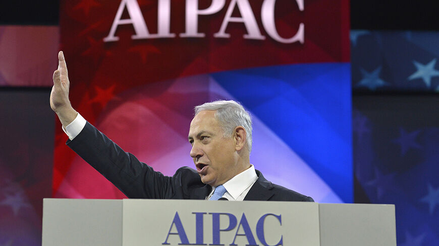Israeli Prime Minister Benjamin Netanyahu acknowledges applause as he arrives to address the American Israel Public Affairs Committee (AIPAC), in Washington, March 4, 2014. Netanyahu urged world powers on Tuesday not to allow Iran to retain the ability to enrich uranium, saying it must be stripped of all nuclear technologies with bomb-making potential. REUTERS/Mike Theiler (UNITED STATES - Tags: POLITICS TPX IMAGES OF THE DAY) - RTR3G15H