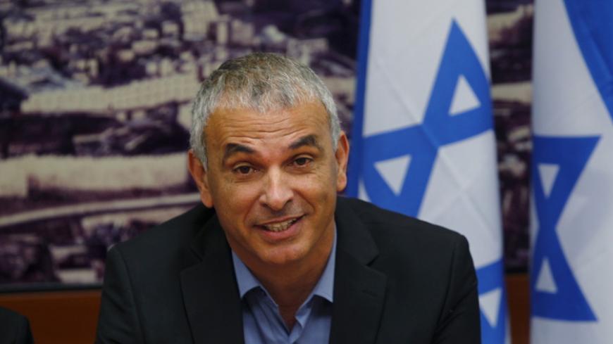 Moshe Kahlon, Israel's new Finance Minister, attends a meeting at the Finance Ministry in Jerusalem May 18, 2015. Boosting competition in Israel's banking system and the economy as a whole as well as bringing down property prices will be priorities for the country's new finance minister, he said on Monday. REUTERS/Ronen Zvulun - RTX1DH88