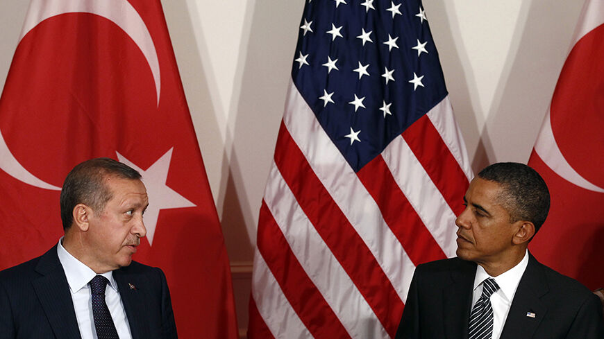 U.S. President Barack Obama and Turkish Prime Minister Tayyip Erdogan (L) meet in New York September 20, 2011.  Obama condemned a deadly bombing in Ankara on Tuesday, as he met Erdogan on the sidelines of the U.N. General Assembly.    REUTERS/Kevin Lamarque  (UNITED STATES - Tags: POLITICS TPX IMAGES OF THE DAY) - RTR2RLKF