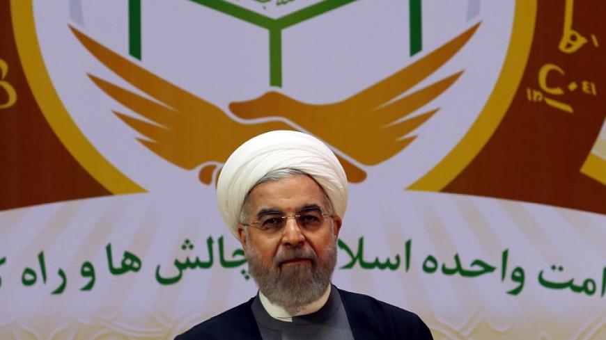 Iranian President Hassan Rouhani looks on as he chairs the 28th International Islamic Unity Conference in the capital Tehran on January 7, 2015. AFP PHOTO / ATTA KENARE        (Photo credit should read ATTA KENARE/AFP/Getty Images)