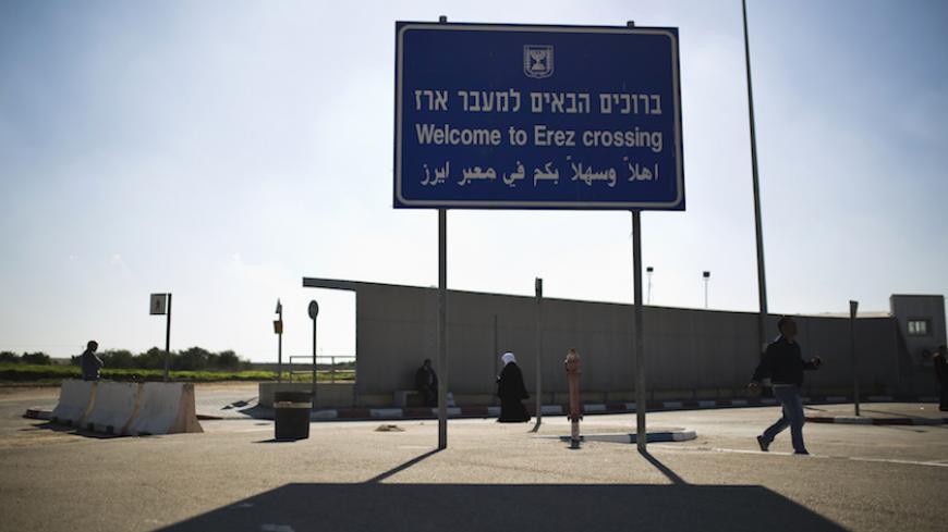 A sign is seen at the Erez border crossing between Israel and northern Gaza Strip December 28, 2014. Hamas authorities in the Gaza Strip prevented on Sunday a group of Palestinian children who lost parents in the July-August war with Israel from making a rare goodwill visit to the Jewish state, organisers of the trip said. REUTERS/Amir Cohen (ISRAEL - Tags: POLITICS CIVIL UNREST) - RTR4JF9V