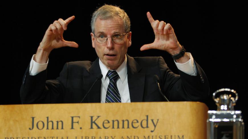 U.S. Ambassador to Syria Robert Ford speaks after receiving a 2012 John F. Kennedy Profile in Courage award during ceremonies at the John F. Kennedy Library in Boston, Massachusetts in this May 7, 2012 file photo. Ford is retiring at the end of the month, current and former U.S. Officials said on January 4, 2014. REUTERS/Brian Snyder/Files (UNITED STATES - Tags: POLITICS) - RTX1883T