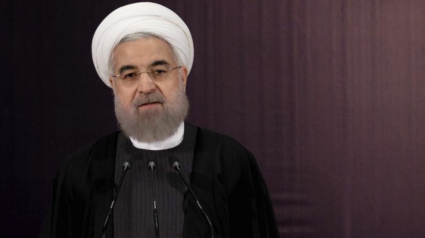 Iranian President Hassan Rouhani talks to journalists after he registered for February's election of the Assembly of Experts, the clerical body that chooses the supreme leader, at Interior Ministry in Tehran December 21, 2015. REUTERS/Raheb Homavandi/TIMA ATTENTION EDITORS - THIS IMAGE WAS PROVIDED BY A THIRD PARTY. FOR EDITORIAL USE ONLY. - RTX1ZKIR