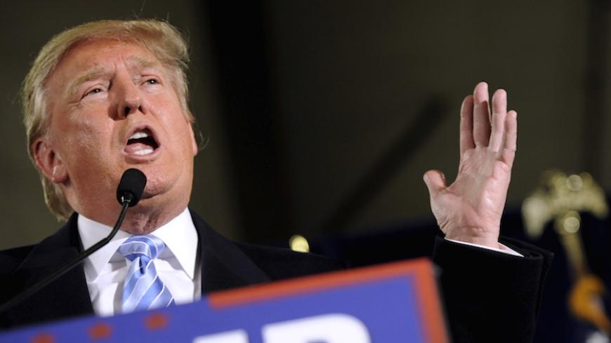 U.S. Republican presidential candidate Donald Trump speaks at a rally at Iowa State University in Ames, Iowa January 19, 2016. REUTERS/Mark Kauzlarich - RTX234YS