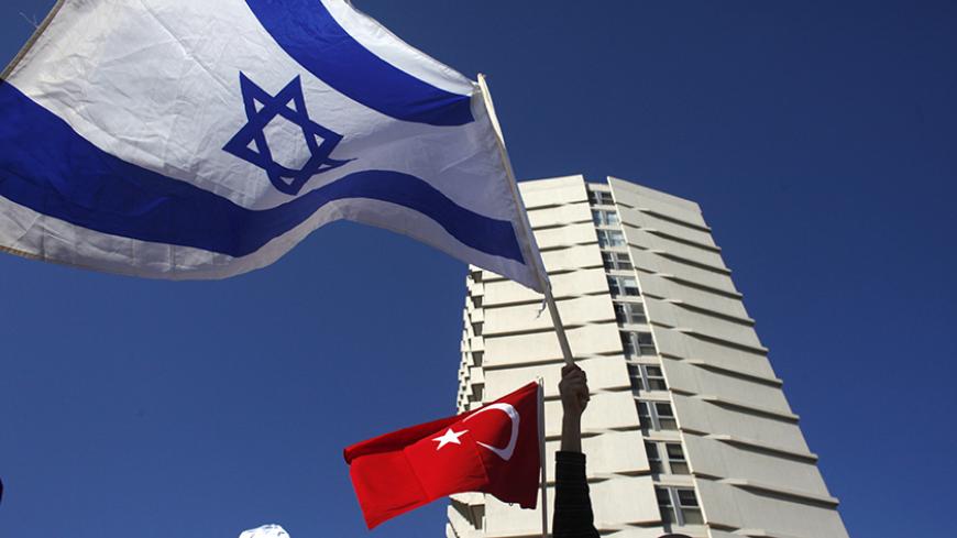 Employees from a Turkish-owned company in Israel protest against the recent tensions between the two countries outside the Turkish embassy in Tel Aviv December 28, 2010. Israel will not apologise to Turkey for a May raid on a Turkish-led convoy that killed nine Turkish activists and talks to mend ties have so far fallen short, Prime Minister Benjamin Netanyahu said on Monday. REUTERS/Nir Elias (ISRAEL - Tags: POLITICS) - RTXW1ZV