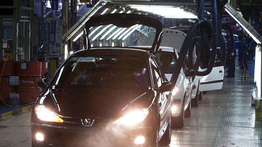 Iranian made Peugeot 206 cars are seen on a production line of carmaker Iran Khodro, west of Tehran June 20, 2011. Unusually for the Middle East, Iran has developed its domestic car industry for five decades and produced 1.6 million vehicles last year, about half of them made by Iran Khodro which aims to export around 10 percent of its production this year. Even with sanctions, which have scared off some suppliers from exporting to Iran, and a limp economy, Iran Khodro says sales rose 18 percent in 2010 and