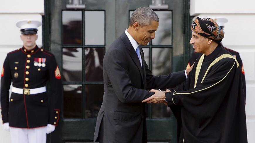 U.S. President Barack Obama (L) welcomes Oman's Deputy Prime Minister Sayyid Fahd bin Mahmoud Al Said as he plays host to leaders and delegations from the Gulf Cooperation Council countries at the White House in Washington May 13, 2015.  REUTERS/Jonathan Ernst - RTX1CV9P