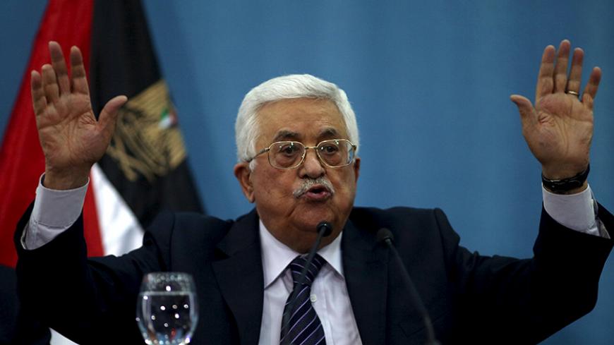 Palestinian President Mahmoud Abbas gestures as he speaks to the media in the West Bank city of Ramallah January 23, 2016. REUTERS/Mohamad Torokman - RTX23PR4