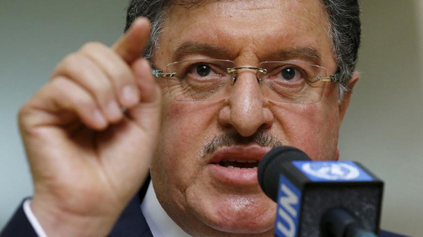Salim al-Muslat, spokesman for the High Negotiations Committee (HNC), addresses a news conference after meeting U.N. mediator for Syria Staffan de Mistura during peace talks at the United Nations in Geneva, Switzerland, February 1, 2016. REUTERS/Denis Balibouse - RTX24Z1B