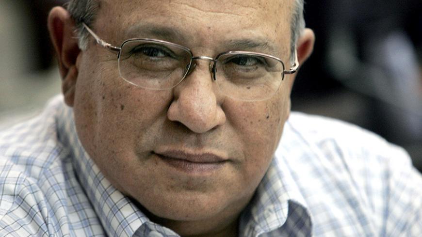 Meir Dagan, head of Israel's spy agency Mossad, attends a Foreign Affairs and Defence committee meeting at the Israeli parliament in Jerusalem in this December 18, 2006 file photo. Dagan sees no reason to resign over a scandal-fraught assassination in Dubai, and Prime Minister Benjamin Netanyahu is unlikely to ask him to, a confidant of the Israeli spymaster said on Thursday. REUTERS/Yonathan Weitzman/Files (JERUSALEM - Tags: POLITICS MILITARY HEADSHOT) - RTR2AH3X