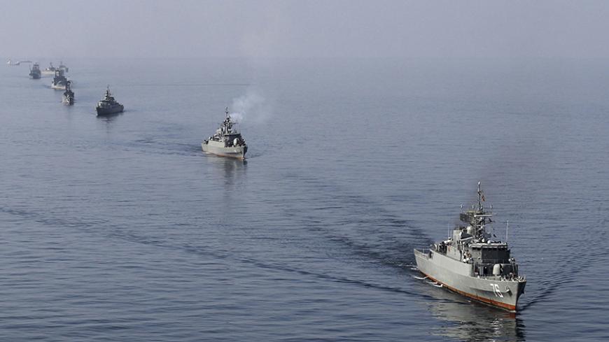 EDITORS' NOTE: Reuters and other foreign media are subject to Iranian restrictions on leaving the office to report, film or take pictures in Tehran.
Iranian naval ships take part in a naval parade on the last day of the Velayat-90 war game in the Sea of Oman near the Strait of Hormuz in southern Iran January 3, 2012. Iran will take action if a U.S. aircraft carrier which left the area because of Iranian naval exercises returns to the Gulf, the state news agency quoted army chief Ataollah Salehi as saying o