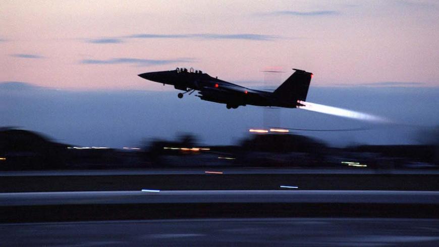 A U.S. Air Force F-15E Strike Eagle takes off from Aviano Air Base, Italy, for an air strike mission in support of NATO Operation Allied Force, March 28. Operation Allied Force is the air operation against targets in the Federal Republic of Yugoslavia. - RTXIW23