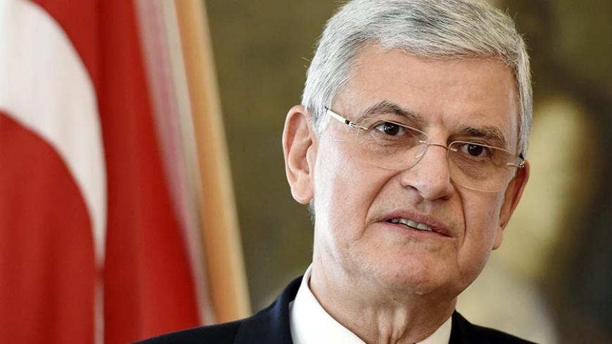 Turkish EU Affairs Minister Volkan Bozkir reacts during a press conference in Helsinki, Finland, March 23, 2016. REUTERS/Jussi Nukari/Lehtikuva   ATTENTION EDITORS - THIS IMAGE WAS PROVIDED BY A THIRD PARTY. FOR EDITORIAL USE ONLY. NOT FOR SALE FOR MARKETING OR ADVERTISING CAMPAIGNS. THIS PICTURE IS DISTRIBUTED EXACTLY AS RECEIVED BY REUTERS, AS A SERVICE TO CLIENTS. NO THIRD PARTY SALES. NOT FOR USE BY REUTERS THIRD PARTY DISTRIBUTORS. FINLAND OUT. NO COMMERCIAL OR EDITORIAL SALES IN FINLAND. - RTSBVC3