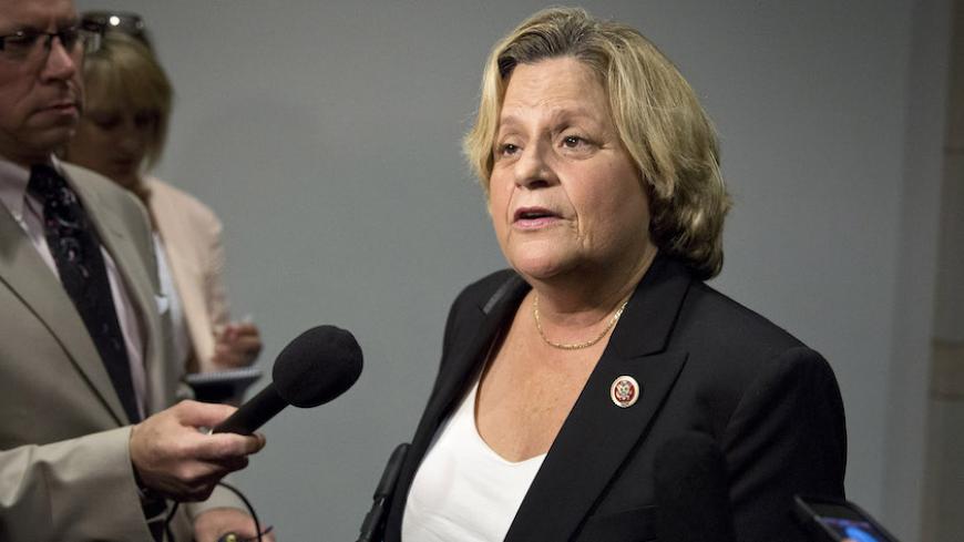 U.S. Representative Ileana Ros-Lehtinen (R-FL) speaks to the media before attending a closed meeting for members of Congress on the situation in Syria at the U.S. Capitol in Washington September 1, 2013. U.S. Secretary of State John Kerry said on Sunday tests showed that sarin nerve gas was used in a deadly August 21 chemical attack near Damascus as he sought to build the case to convince skeptical lawmakers to authorize a military strike against the Syrian government. REUTERS/Joshua Roberts    (UNITED STAT