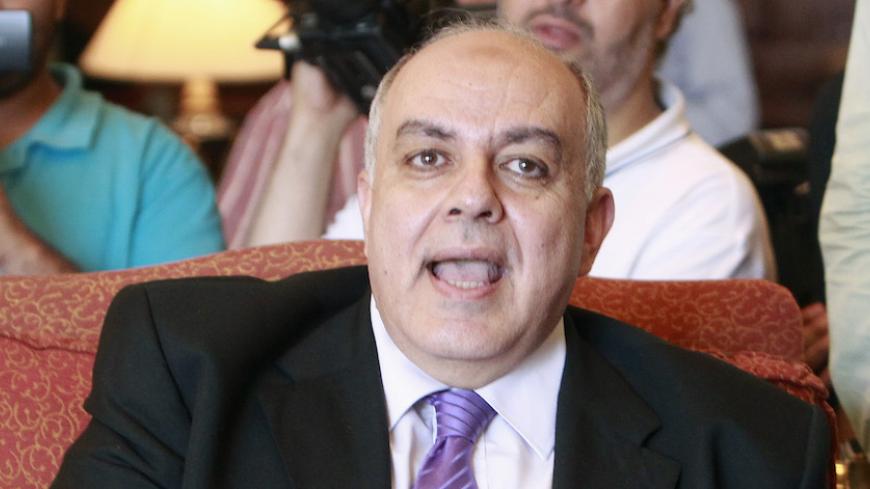 Amr Darrag, member of Egypt's National Alliance to Support the Electoral Legitimacy, speaks during a news conference in Cairo July 29, 2013. Europe's top diplomat Catherine Ashton pressed Egypt's rulers on Monday to step back from a growing confrontation with the Muslim Brotherhood of deposed Islamist president Mohamed Mursi, two days after 80 of his supporters were gunned down in Cairo. Raising the prospect of more bloodshed, the Muslim Brotherhood said it would march again on Monday evening on Interior Mi