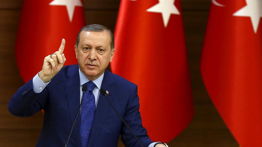 Turkish President Tayyip Erdogan makes a speech during his meeting with mukhtars at the Presidential Palace in Ankara, Turkey, March 16, 2016.  REUTERS/Umit Bektas - RTSAPB4