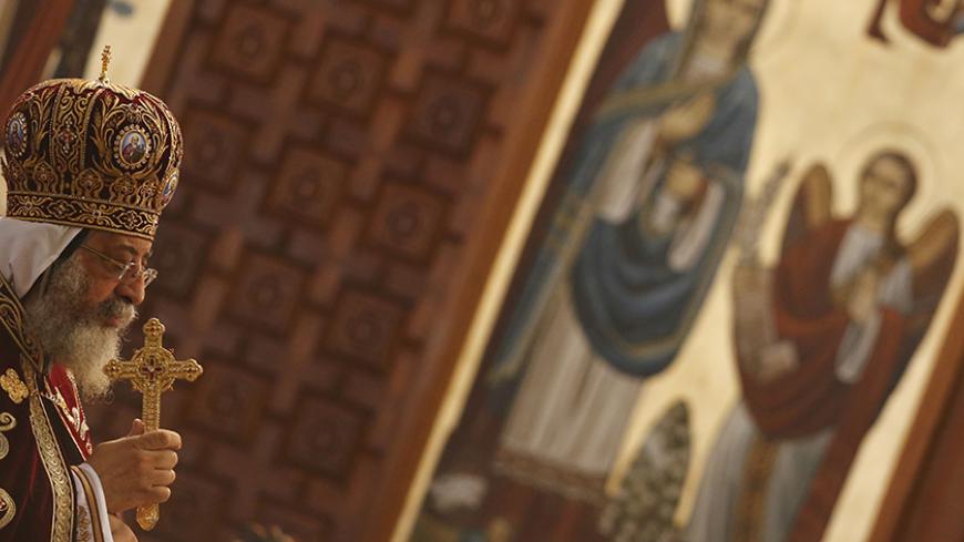 Pope Tawadros II, the 118th Pope of the Coptic Orthodox Church of Alexandria and Patriarch of the See of St. Mark Cathedral, leads Egypt's Coptic Christmas eve mass in Cairo, Egypt, January 6, 2016. REUTERS/Amr Abdallah Dalsh - RTX21BZJ