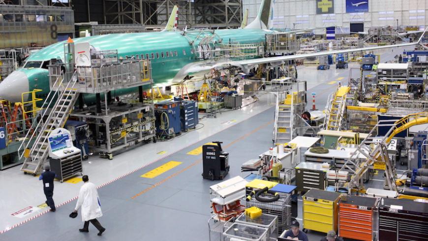 A Boeing 737 MAX plane is seen during a media tour of the Boeing plant in Renton, Washington December 7, 2015. Orders for long-lasting U.S. manufactured goods surged in April on strong demand for transportation equipment and a range of other products . REUTERS/Matt Mills McKnight/File Photo - RTX2EBUC