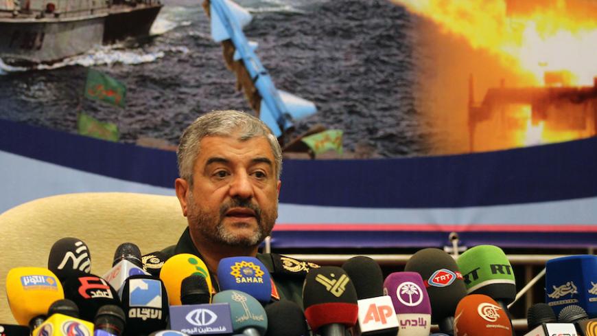 Iranian Revolutionary Guards commander Brigadier General Mohammad Ali Jafari holds a press conference in Tehran on September 16, 2012. Jafari said members of his elite special operations unit, the Quds Force, are present in Syria and Lebanon but only to provide "counsel." AFP PHOTO/ATTA KENARE        (Photo credit should read ATTA KENARE/AFP/GettyImages)