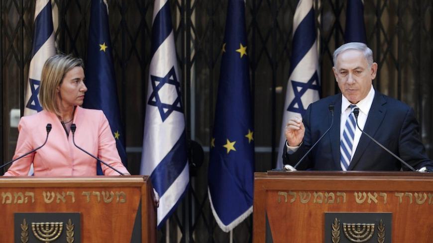 Israeli Prime Minister Benjamin Netanyahu (R) and European Union foreign policy chief Federica Mogherini speak to media following their meeting in Jerusalem, on May 20, 2015. AFP PHOTO / POOL / DAN BALILTY        (Photo credit should read DAN BALILTY/AFP/Getty Images)